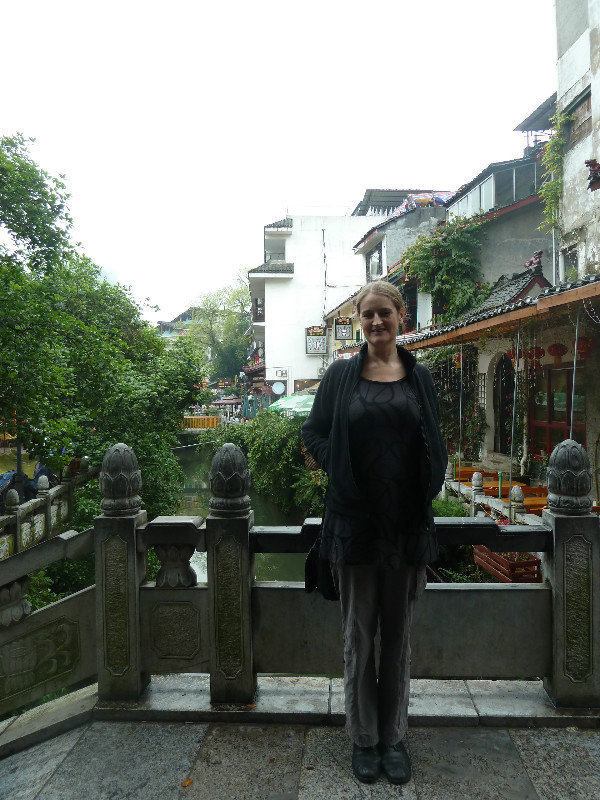 Lottie posing on a pretty little bridge in Yangshuo