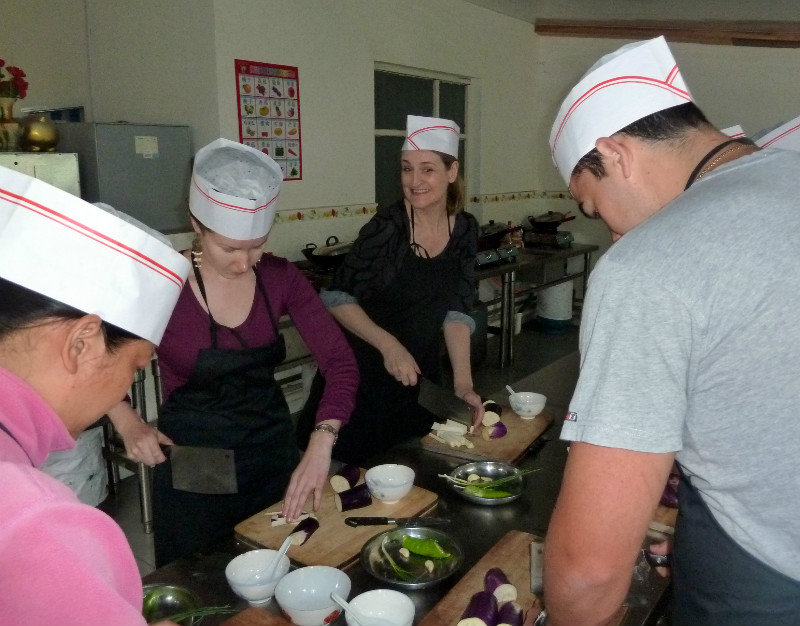 Preparing aubergines at our cookery class in Yangshuo