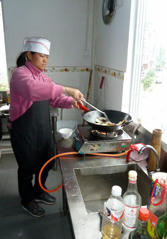 Watching the expert at our cookery class in Yangshuo