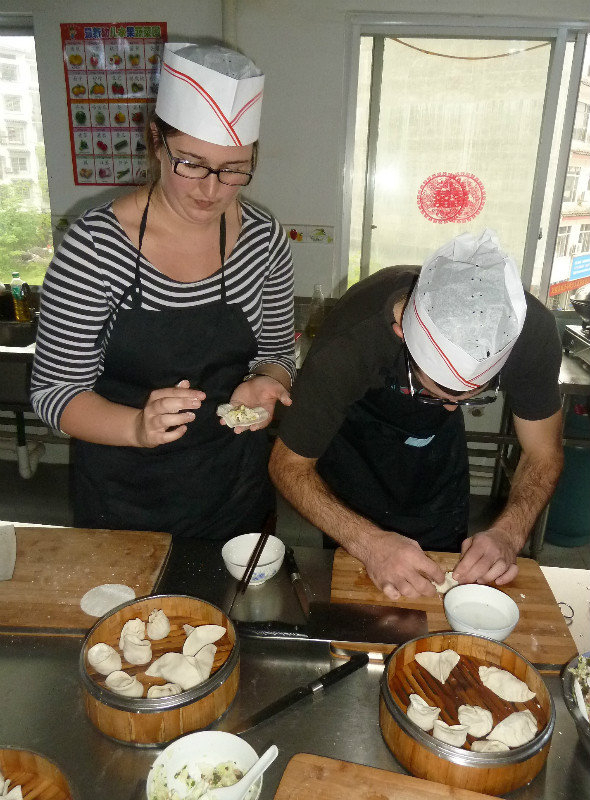 Sarah and Tom making Chinese steamed dumplings