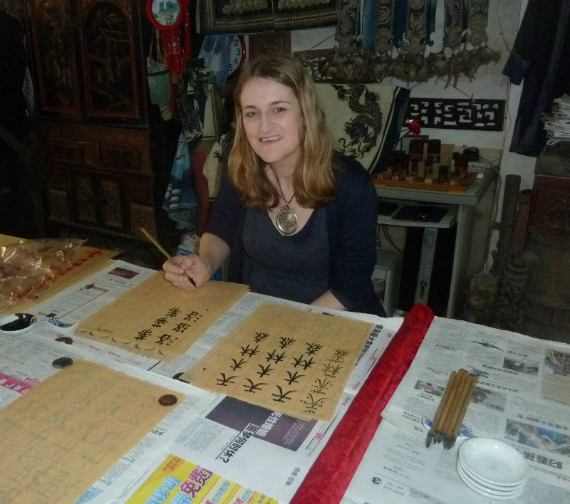 Enjoying my calming calligraphy lesson in Yangshuo