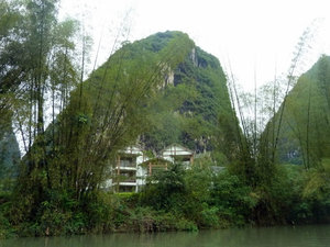 Posh hotel seen on bamboo raft trip on the River Li near Langshuo