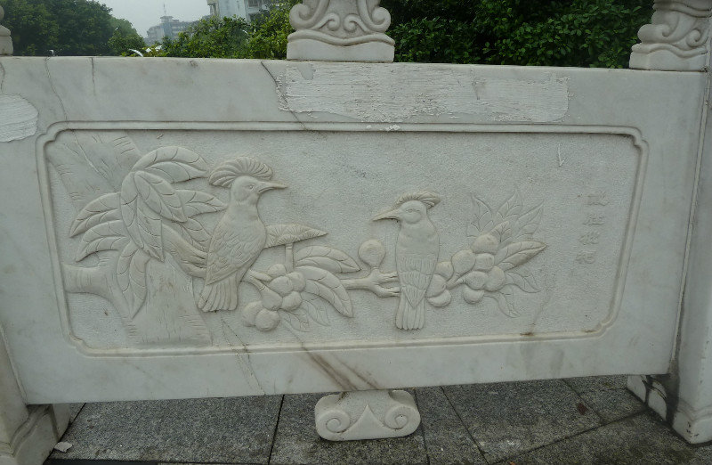 Pretty carving relief on the bridge panels, Guilin