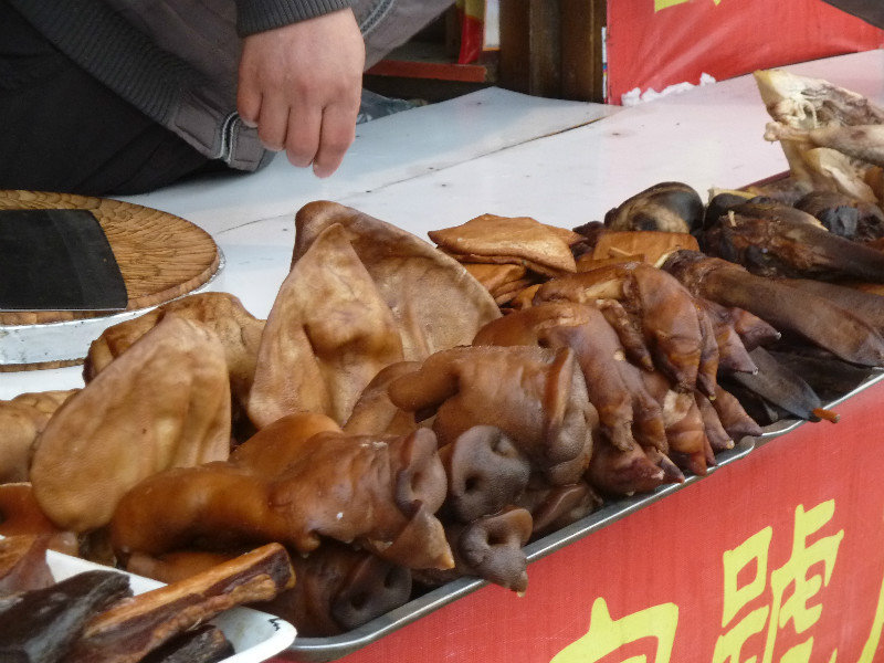 Trying to tempt us with roasted pigs heads and trotters
