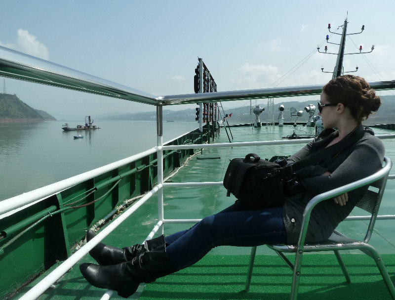 Renee enjoying a relaxing afternoon in the sunshine watching the Yangtze River scenery pass by
