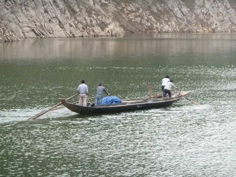 Boatmen rowing back to their villages