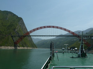 New red arched bridge leading into Wu Gorge