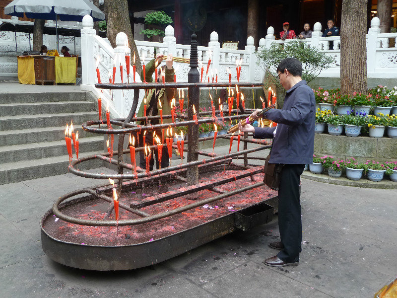 Incense and candles at the Buddhist temple