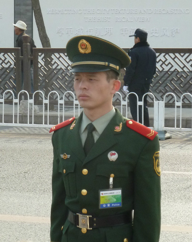 Very serious soldier on duty at the Beijing Marathon