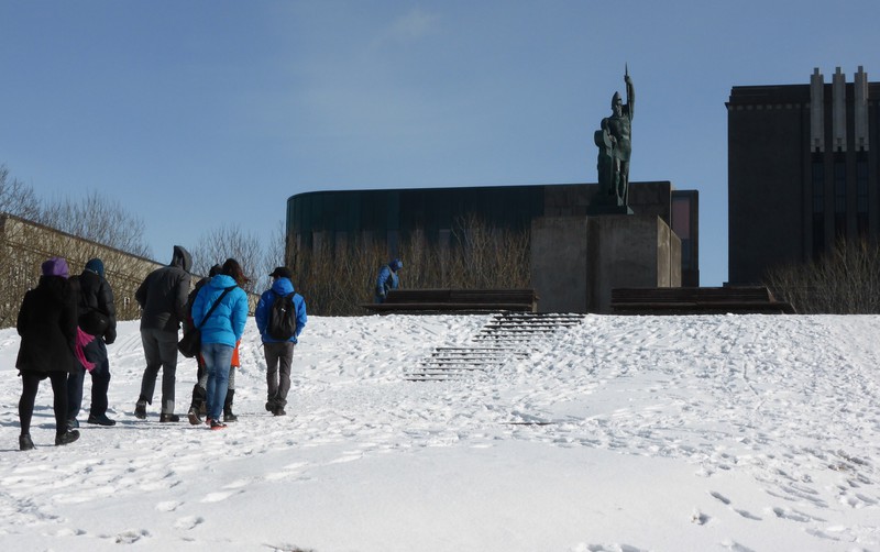 Walking up the snow covered hill to Ingolfur Arnerson's statue