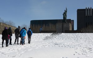 Walking up the snow covered hill to Ingolfur Arnerson's statue