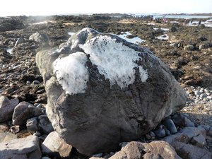 Ice on rocks at the beach