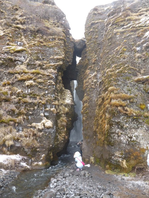 Crack in the rocks hiding Gljufrabui Waterfall