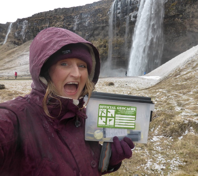 Finding the geocache at Seljalandsfoss Waterfall