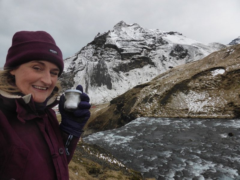 Finding the geocache at the top of Skogafoss Waterfall