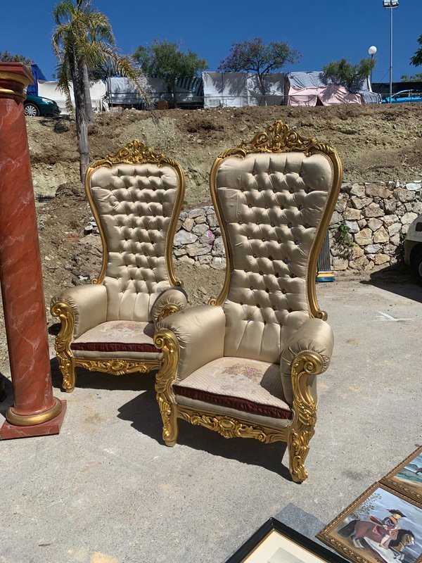 A couple of chairs at the market. 