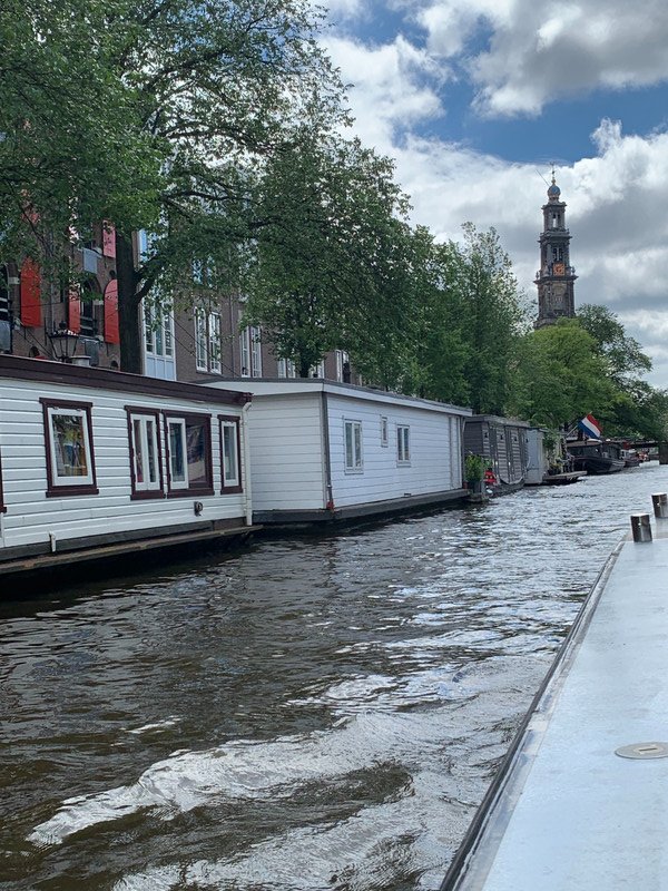 More houseboats along the canal .