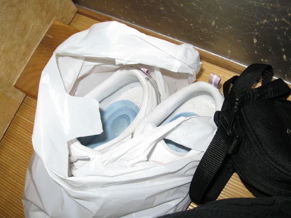 My shoes in a bag at the japanese restraunt