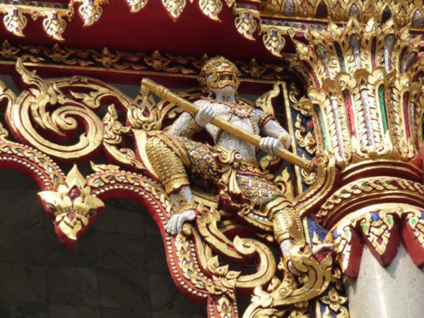 Figure guarding the temple in Silom