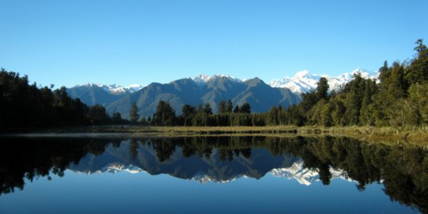 Mount Cook and Mount Tasman reflected in the waters of Lake Matheson
