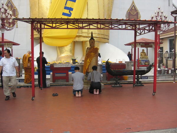 Buddhists in Prayer