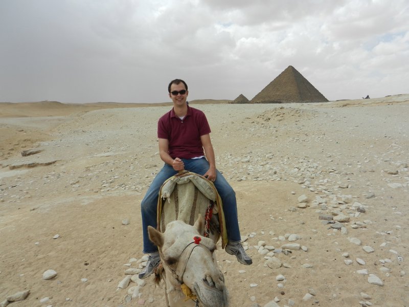 Micahel on his camel at the pyramids
