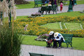 Reading on a park bench in Cusco