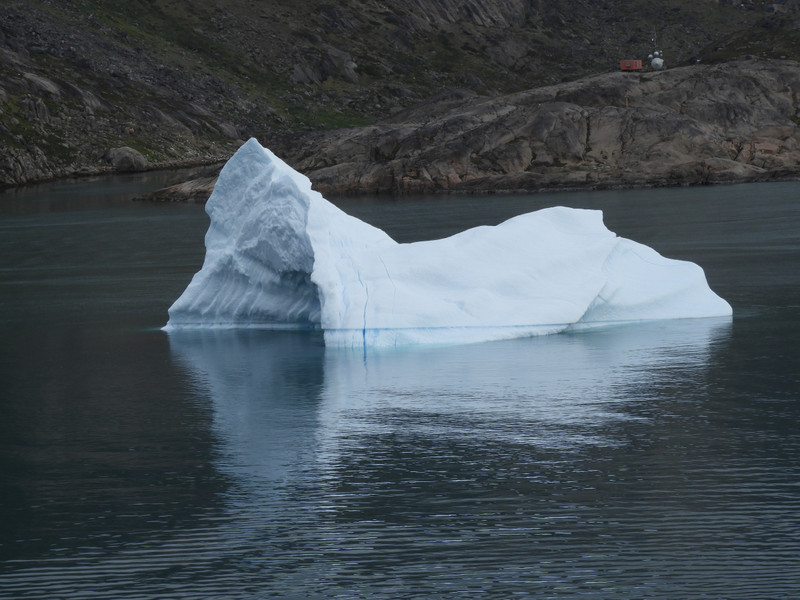 Iceberg that looks like entrance to a cave