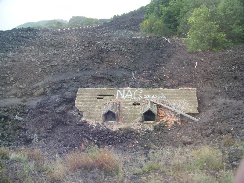 House burried by lava flow