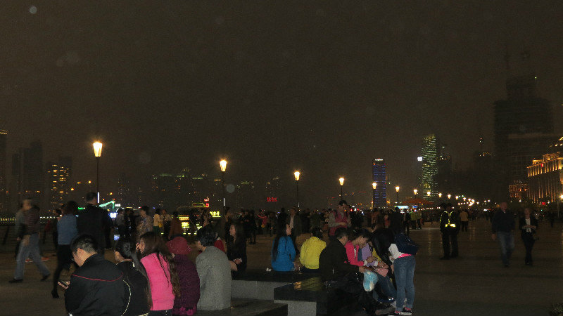 People along the Bund at night in Shanghai