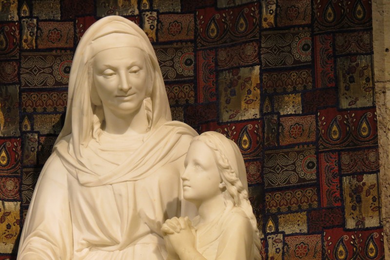 Statue of Mary as a child with her mother
