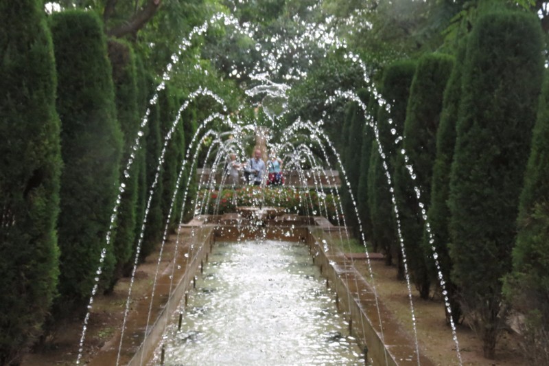 Fountain in garden by palace