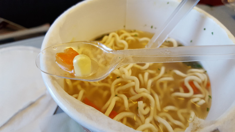 Spoon provided to eat the Chewy Noodle Soup. 