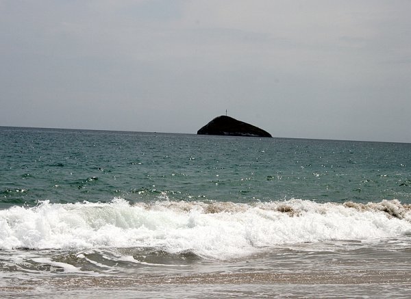 Frigatebird island on the horizon