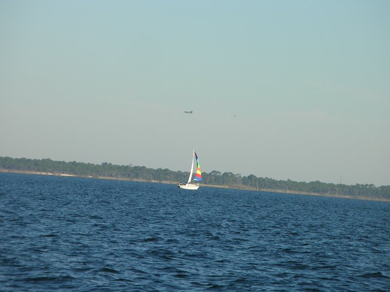 Sailboat and Fighter Jet