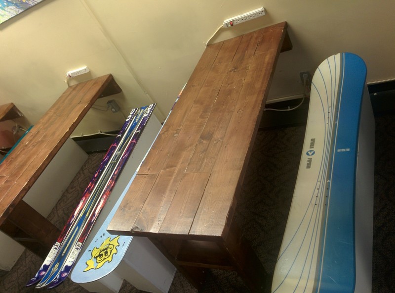 Seats in the hostel made from old snowboards and ski's