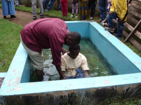 Franky getting baptized