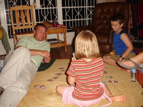Ryan playing "Go Fish" with the kids on the floor