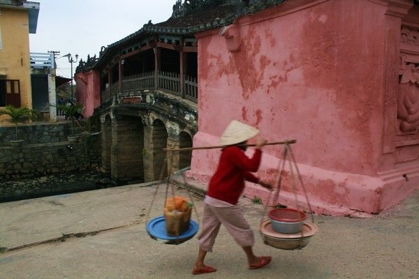 Woman by the Japanese Covered Bridge, Hoi An