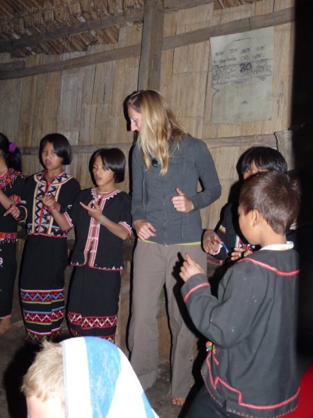 Lindsay dancing with the hill tribe children