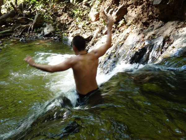 Matt sliding down the waterfall