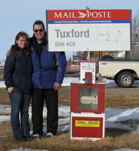 Our hosts posing at the "post office"!