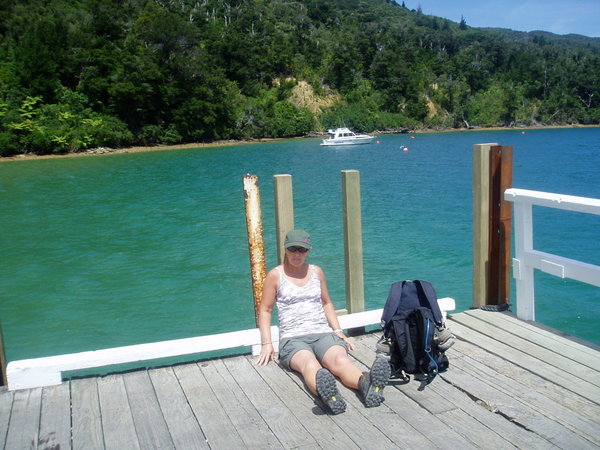 resting on the jetty at the end of the hike