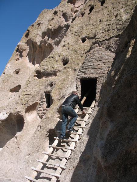 Mike climbing into a cavate