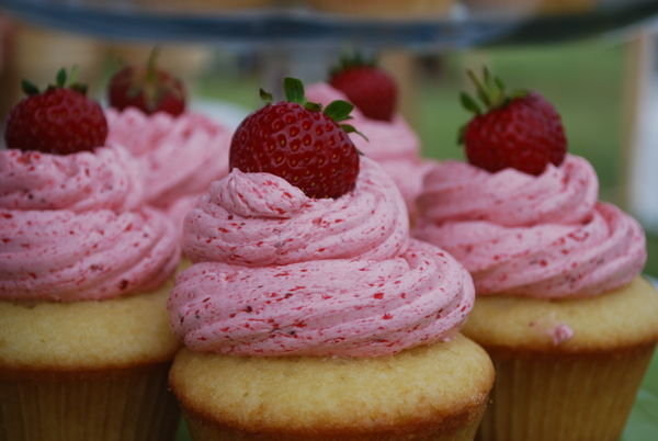 Delicious strawberrry topped cupcakes
