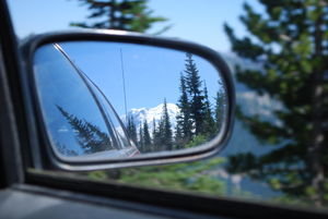 A glimpse of the mountain from the side view mirror