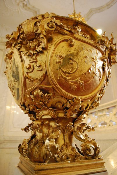 Gold statue on staircase in the Hofburg Complex