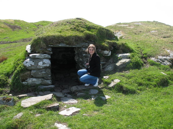 Jennifer and a really old hillside cave near St. Olav's Church