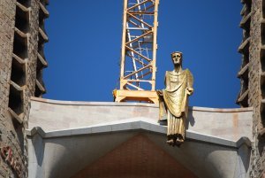 Sculpture of the risen Christ above the Passion facade on Sculpture of the risen Christ above the Passion facade on Sagrada Familia