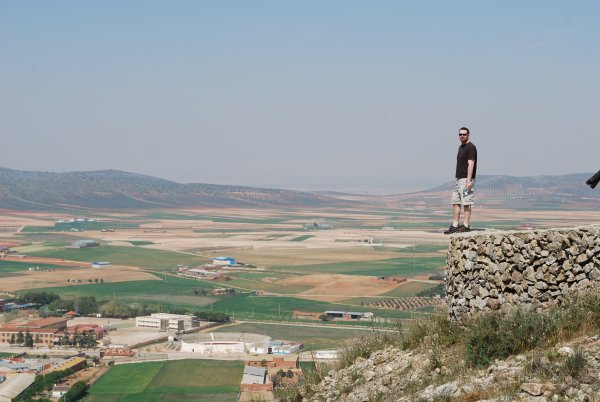 Mike standing on the edge of a cliff in Consuegra
